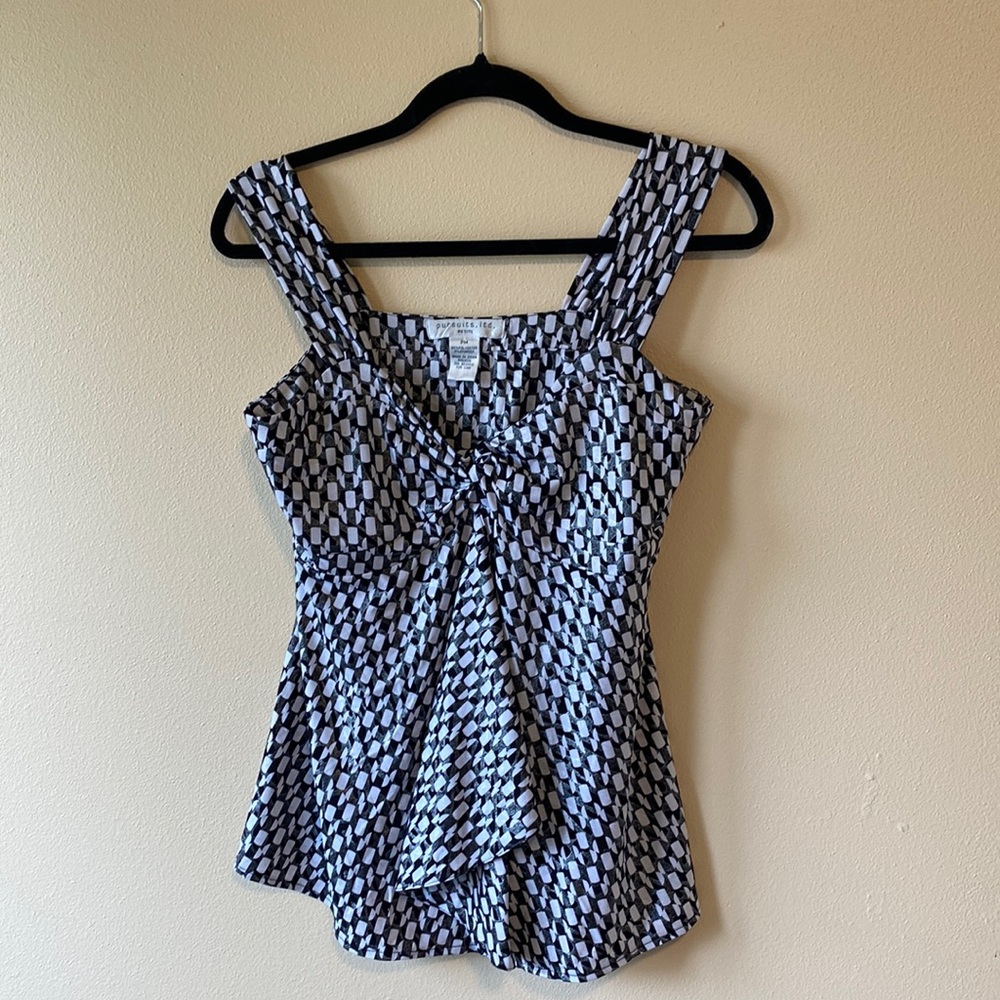 Pursuits, Ltd. Tank